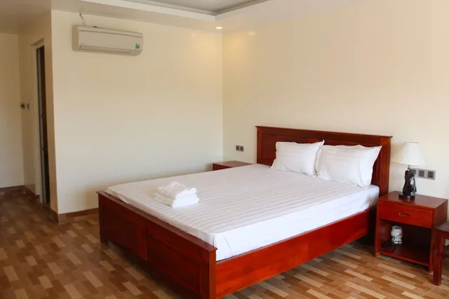 غرفة ديلوكس بسرير كينج بإطلالة على البحر، Phuong Binh House 2/6