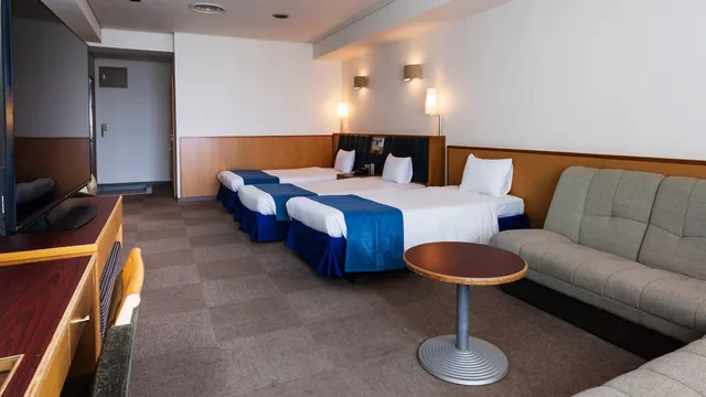 غرفة غربية قياسية ثلاثية بإطلالة على البحر في المبنى الرئيسي للمدخنين، Hotel Resonex Nago 1/1