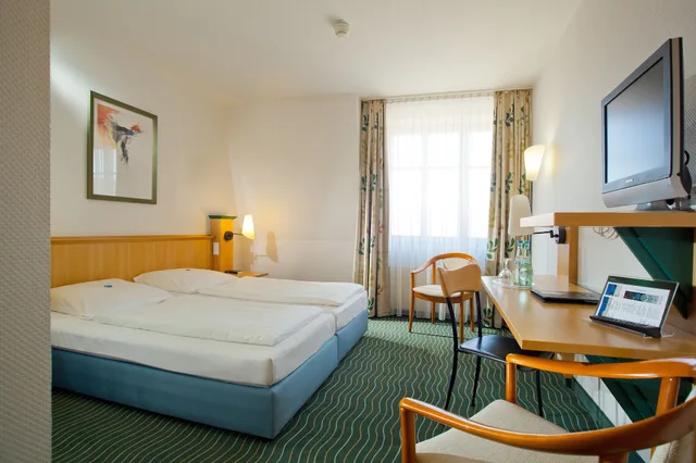 غرفة بسريرين منفصلين، Harzer Kultur- & Kongresshotel Wernigerode 1/2