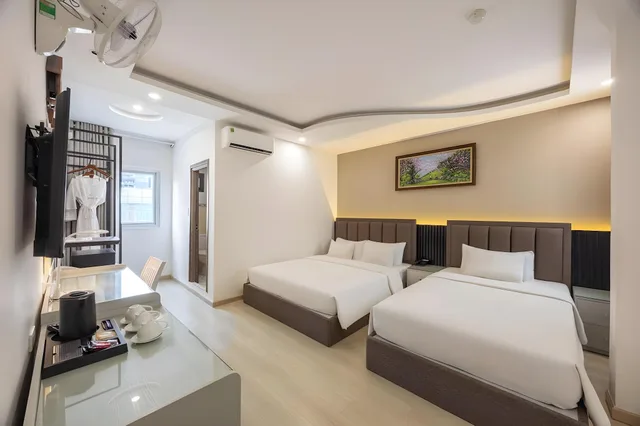 غرفة عائلية ثلاثية بسريرين مزدوجين، A25 Hotel - 65G Nguyen Thai Hoc 2/2