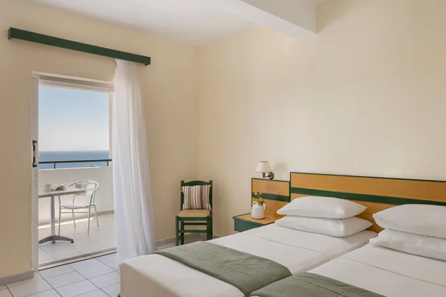 2 Bedrooms, Family, Lateral Side Sea View، Porto Skala Hotel Village 1/10
