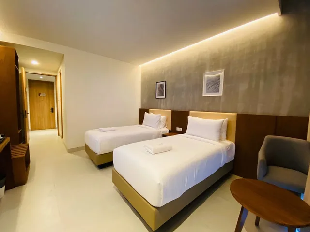 غرفة ديلوكس بسريرين منفصلين بإطلالة على الحديقة، Kambaniru Beach Hotel and Resort 3/6