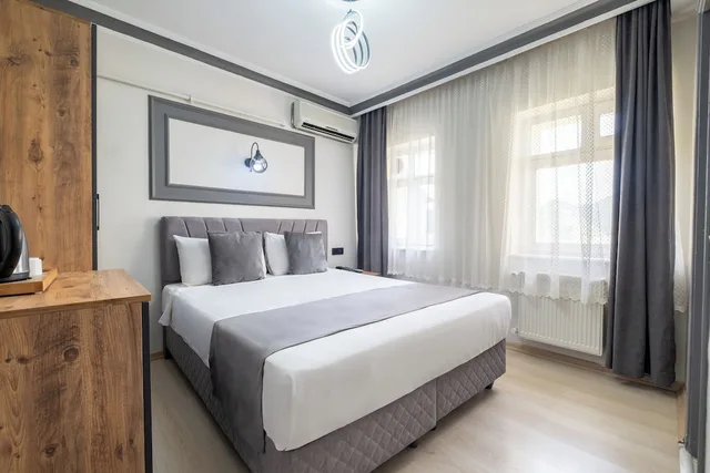 غرفة اقتصادية مفردة بسرير مزدوج، Sur Hotel 4/10