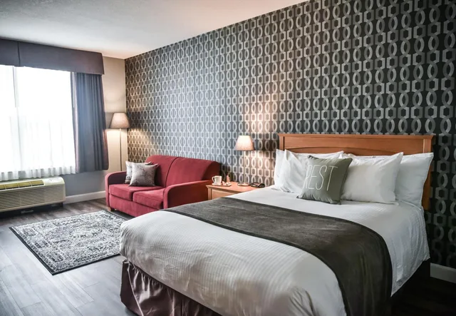 غرفة ديلوكس مع أريكة، Cambridge Hotel Conference Centre 1/5