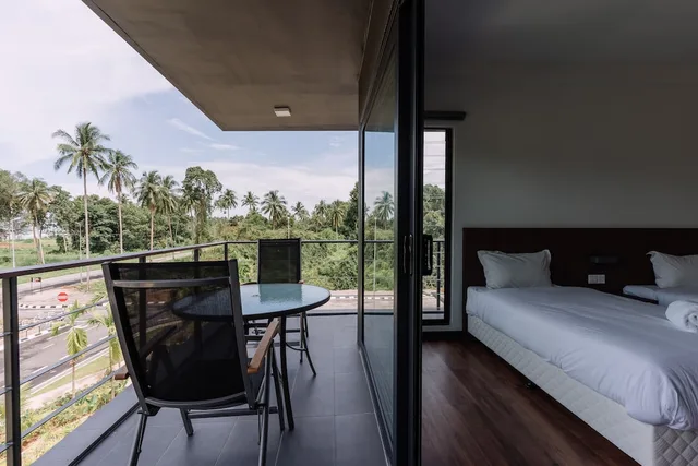 غرفة ديلوكس ركنية بسريرين منفصلين، Roxy Sematan Villa And Townhouse 3/4
