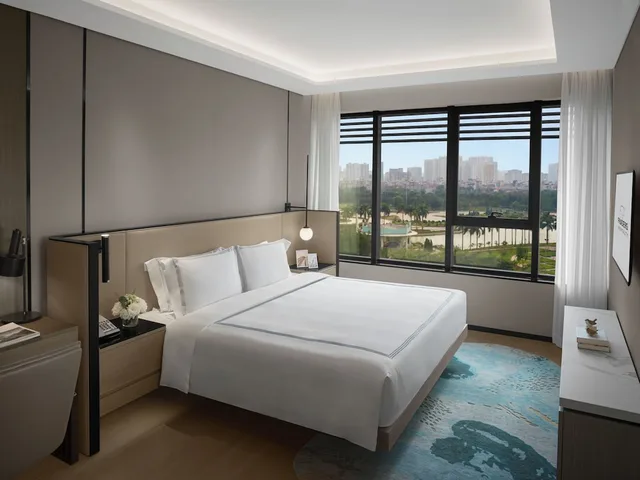 غرفة ديلوكس بسرير كينج وسرير فردي بغرفتي نوم، Fraser Residence Hanoi 1/10