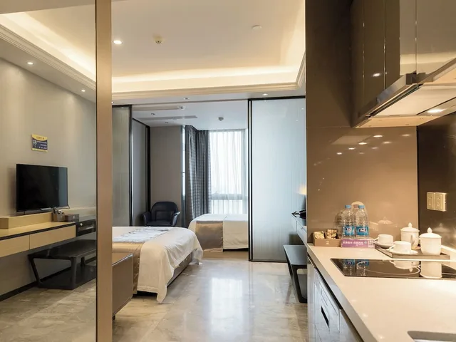 استوديو تنفيذي بسريرين منفصلين وسريرين كوين، Pengman International Apartment Hotel (Beijing Road Jiedeng Duhui) 6/9