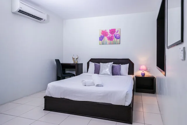 غرفة ديلوكس بسرير كوين، Capital O 90545 Ho Hotel 1/5