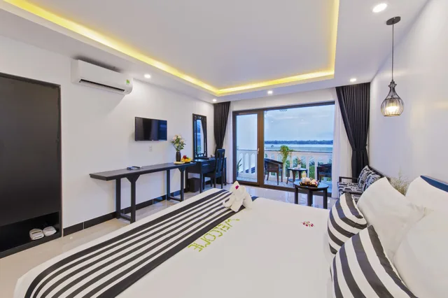 غرفة ديلوكس بسريرين منفصلين بشرفة، Gem Riverside Hotel Hoi An 8/10