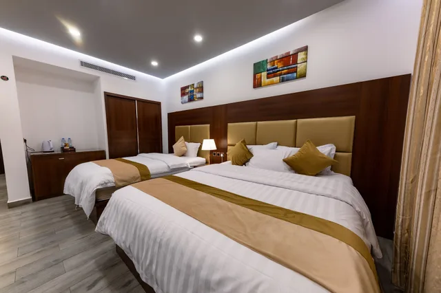 غرفة قياسية ثلاثية بسرير مزدوج وسرير فردي، فندق روزالينا(Rosalina Hotel) 4/6