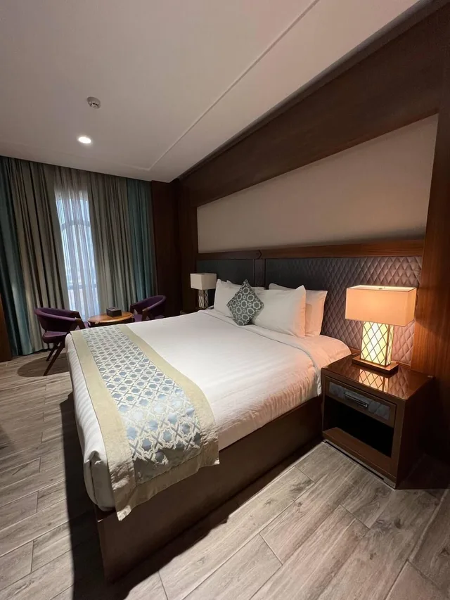 غرفة متصلة بأربعة أسرّة وسرير كوين، فندق فيوليت الششه(Violet Al Shisha Hotel) 4/7