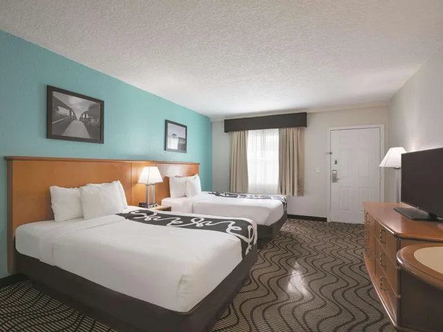 Deluxe, 2 Queen Beds, Pool or Courtyard View, La Quinta Inn By Wyndham Cocoa Beach Port Canaveral 2/3