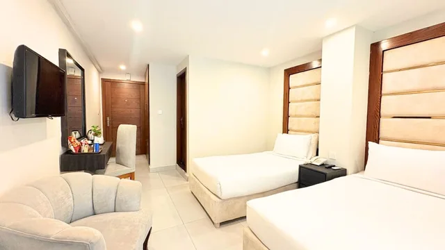 غرفة ديلوكس بسريرين منفصلين، ENVOY CONTINENTAL HOTEL 3/5