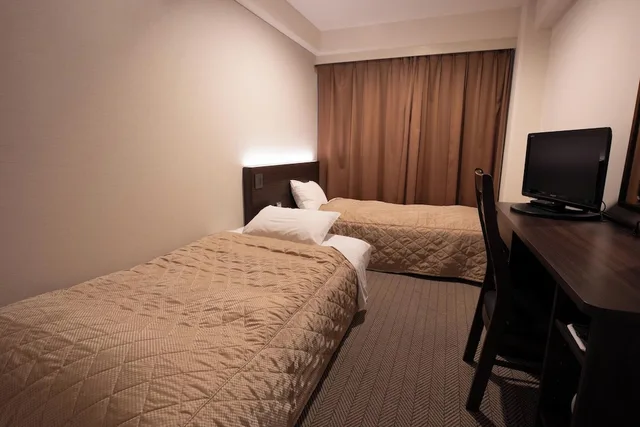 غرفة اقتصادية بسريرين منفصلين مع أريكة، HOTEL SUNROUTE MATSUYAMA 1/1