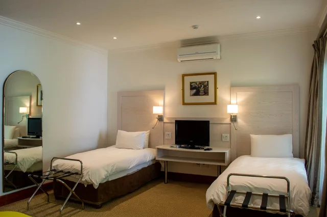 غرفة عائلية بسرير كوين وسريرين منفصلين، Val Du Charron Coach House 8/10