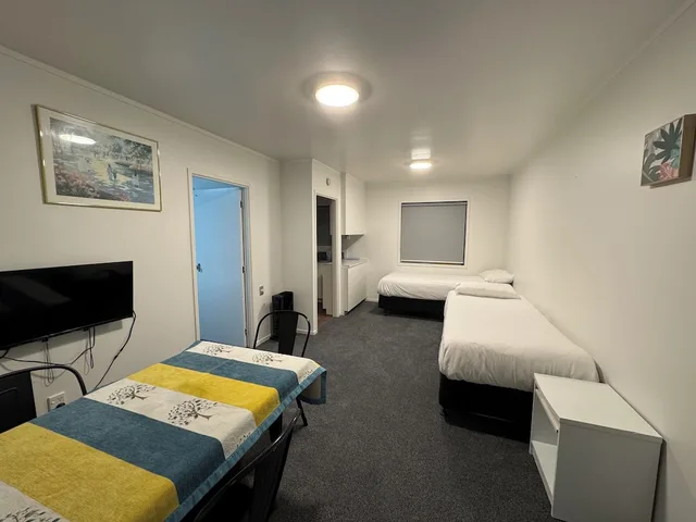 غرفة عائلية بسرير مزدوج وسريرين منفصلين بغرفة نوم واحدة، Siesta Motel 4/10