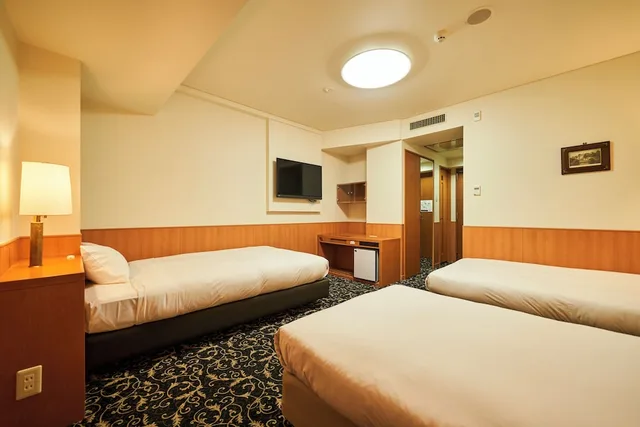 غرفة ثلاثية بسريرين منفصلين مع أريكة في الملحق، Hotel Global View Kushiro 4/6