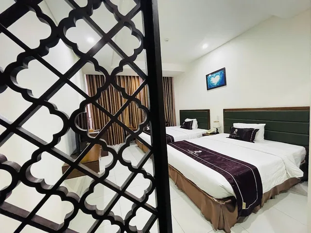 غرفة ديلوكس بسرير مزدوج أو سريرين منفصلين، Phu Cuong Beach Hotel 5/8
