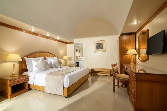 جناح تنفيذي بسرير كينج بإطلالة على الحديقة، Jaz Pyramids Resort 2/3