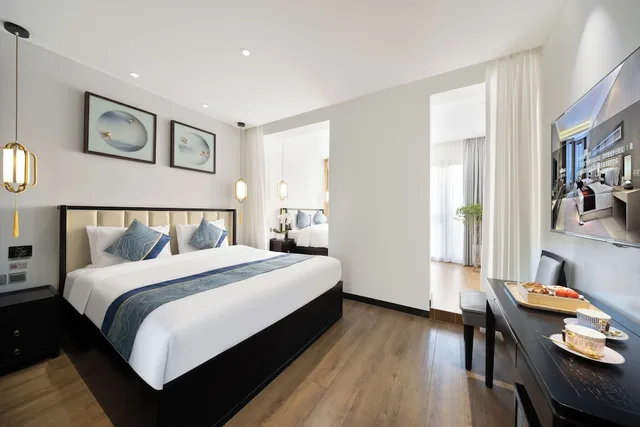 غرفة رباعية بسريرين مزدوجين وسرير كينج وسرير كوين بشرفة، Beijing Aaliyah Wang Fu Jing Forbodden City Boutique Hotel 5/10