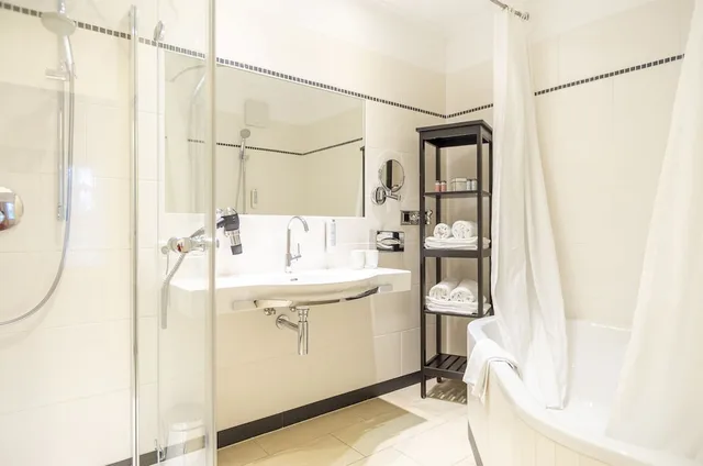 جناح بسرير كينج وسريرين منفصلين بإطلالة على الحديقة بشرفة، Hotel Spiess Spiess Appartement Pension 5/7