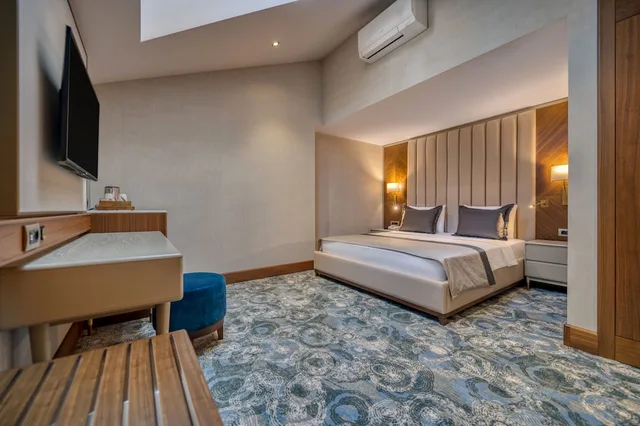 دوبلكس عائلي بسريرين منفصلين وسرير كينج بإطلالة على الجبل مع أريكة، BN Hotel Thermal & SPA Mersin 2/5