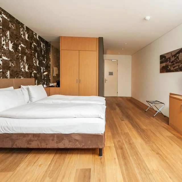 غرفة عائلية بسرير فردي، Sihlpark Hotel 1/5