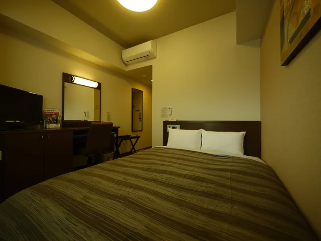 غرفة بسرير نصف مزدوج للمدخنين، Hotel Route-Inn Uozu 4/7
