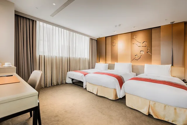غرفة ديلوكس بثلاثة أسرّة مع سرير إضافي، Green World Hotel Grand Nanjing 4/7