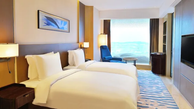 غرفة بريميوم بسريرين منفصلين، CROWNE PLAZA DALIAN SPORTS CENTER 1/10