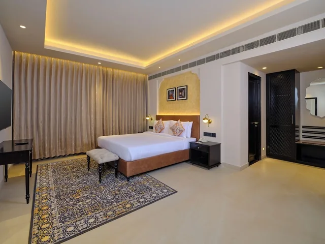 غرفة بريميوم بسرير كينج، Pride Amber Villas Resort 3/4
