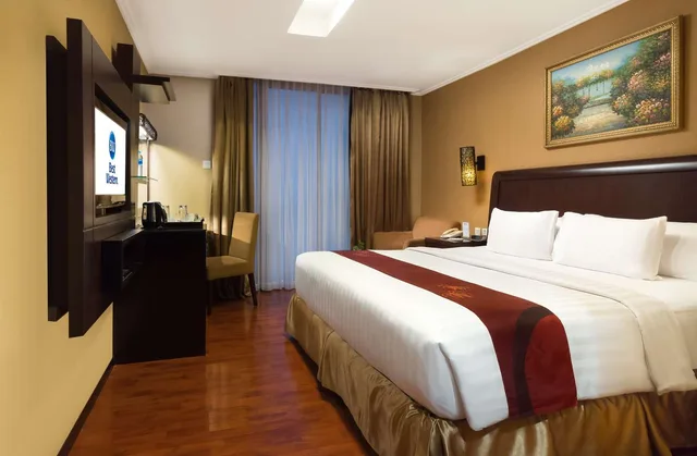غرفة ديلوكس بسرير كينج بإطلالة على المدينة، Best Western Mangga Dua Hotel And Residence 2/4