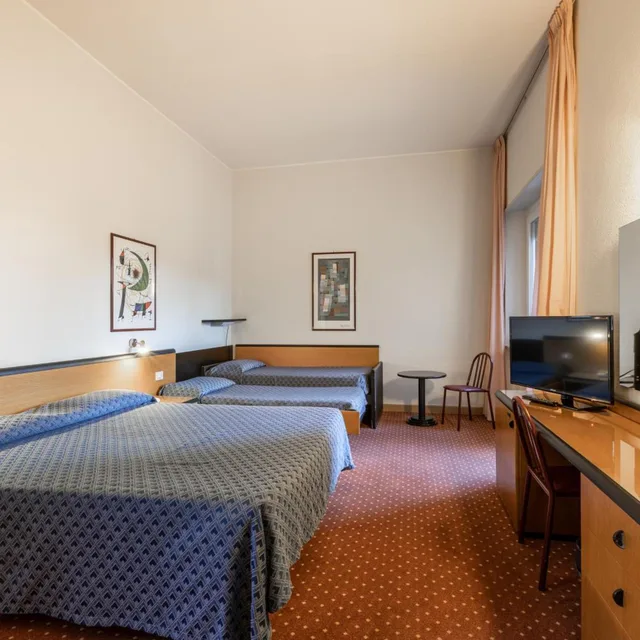 غرفة كلاسيكية رباعية، Hotel Nuova Grosseto 1/8