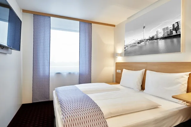 غرفة بزنس بسريرين منفصلين، Mcdreams Hotel Düsseldorf-City 1/4