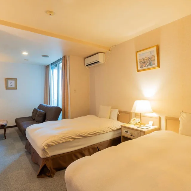 غرفة ديلوكس بسريرين منفصلين بشرفة، Hotel New Century 2/6