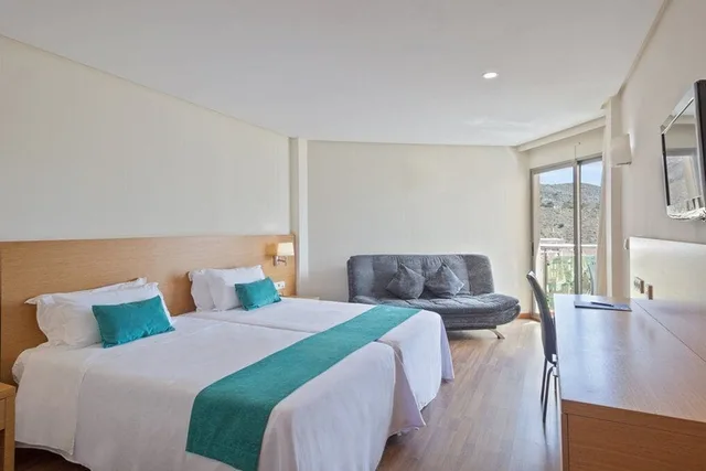 غرفة ديلوكس بسرير كوين بإطلالة جزئية على البحر، Cullera Holiday 1/10