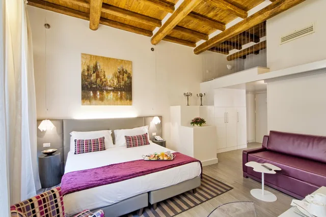 جناح جونيور بسرير كينج، Trevi Palace Luxury Inn 1/4