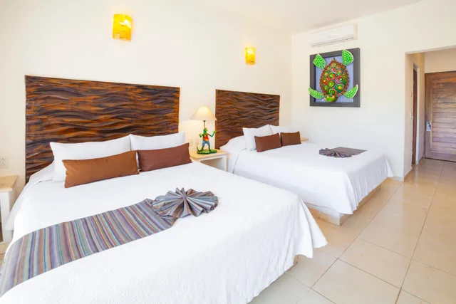 غرفة ديلوكس بسرير مزدوج، Quinta Bella Huatulco 1/3