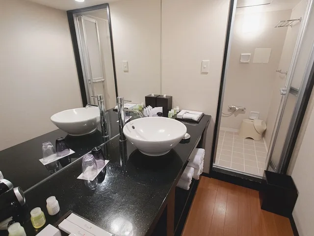 غرفة تقليدية بفرشتي فوتون بإطلالة على البحر، The Luigans Spa And Resort 1/2