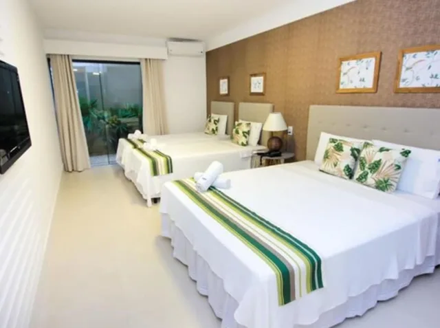 غرفة قياسية رباعية بسرير كوين وسريرين منفصلين، Hotel Premium Recanto Da Passagem 1/4