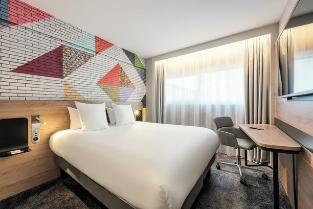 جناح متصل عائلي سوبيريور بسرير كينج وسريرين كوين، Novotel Paris La Defense Nanterre 1/10