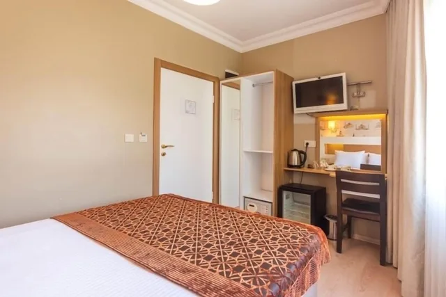 غرفة قياسية بسرير كوين وسرير مزدوج بغرفة نوم واحدة، TAYA HATUN HOTEL 4/10