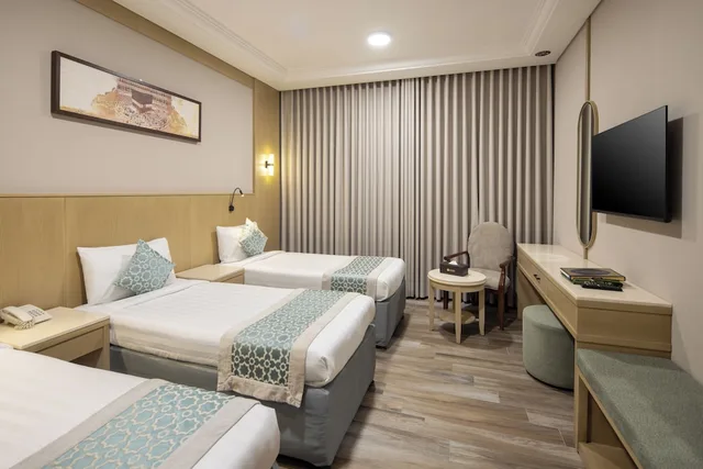 Connecting, 1 Double and 3 Single Beds، فندق عفراء(Afraa Hotel) 6/10