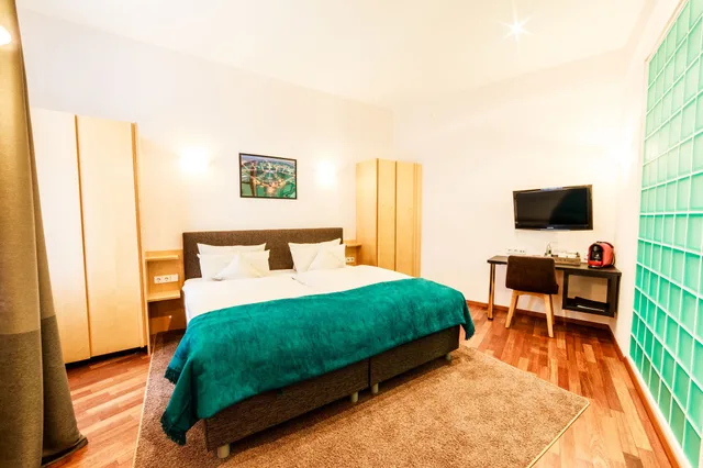 جناح بسرير كينج بغرفة نوم واحدة مع أريكة، Hotel Kaiserhof 8/10