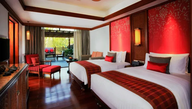 غرفة ديلوكس بسريرين منفصلين بإطلالة على النهر بشرفة، Anantara Xishuangbanna 1/4