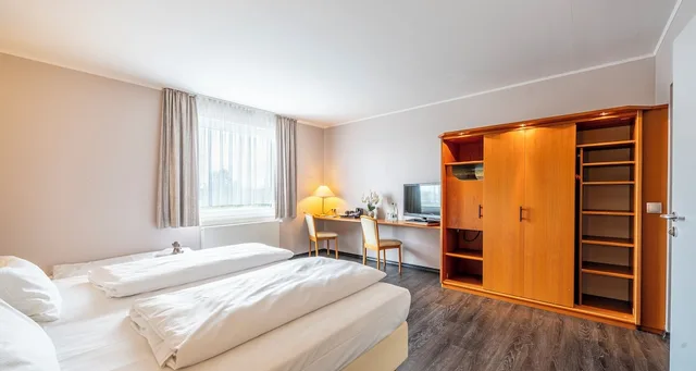 غرفة كومفورت ثلاثية بسرير مزدوج، Plaza Hotel Zwickau 4/7