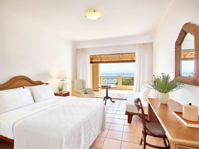 Room, Queen Bed, Lateral Side Sea View, Sofa, Grecotel LUXME Oasis 1/6