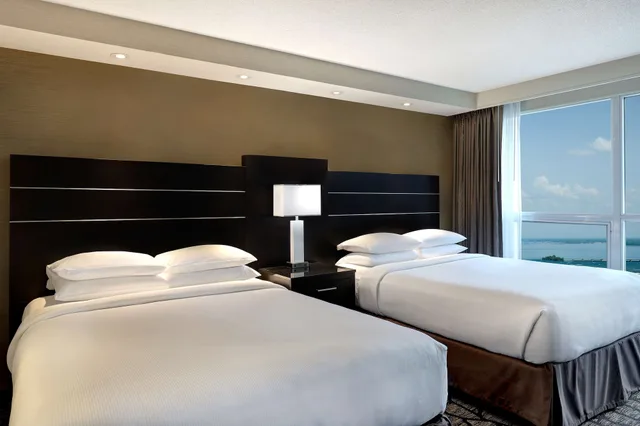 Room, 2 Queen Beds, Partial Falls View, Sofa, Jetted Tub، Embassy Suites By Hilton Niagara Falls Fallsview 2/7