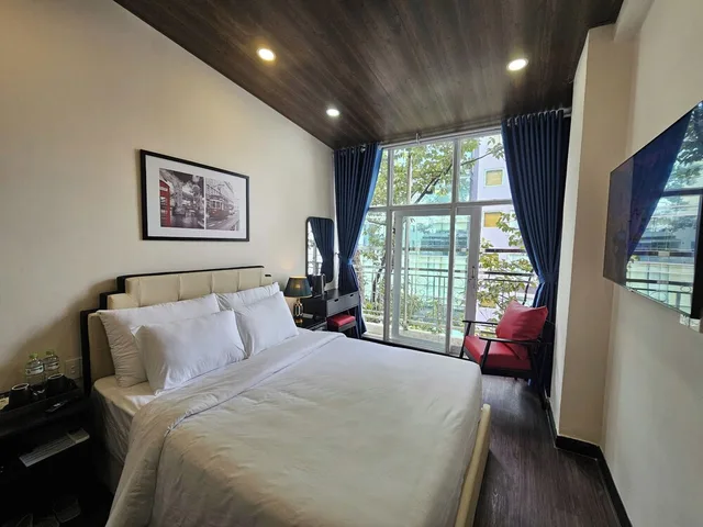 استوديو بسرير كوين بشرفة، The Passion Suite Hotel 1/9