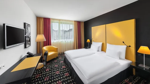 جناح بسرير كينج بإطلالة على الحديقة بغرفة نوم واحدة، Holiday Inn Munich - Westpark 3/7
